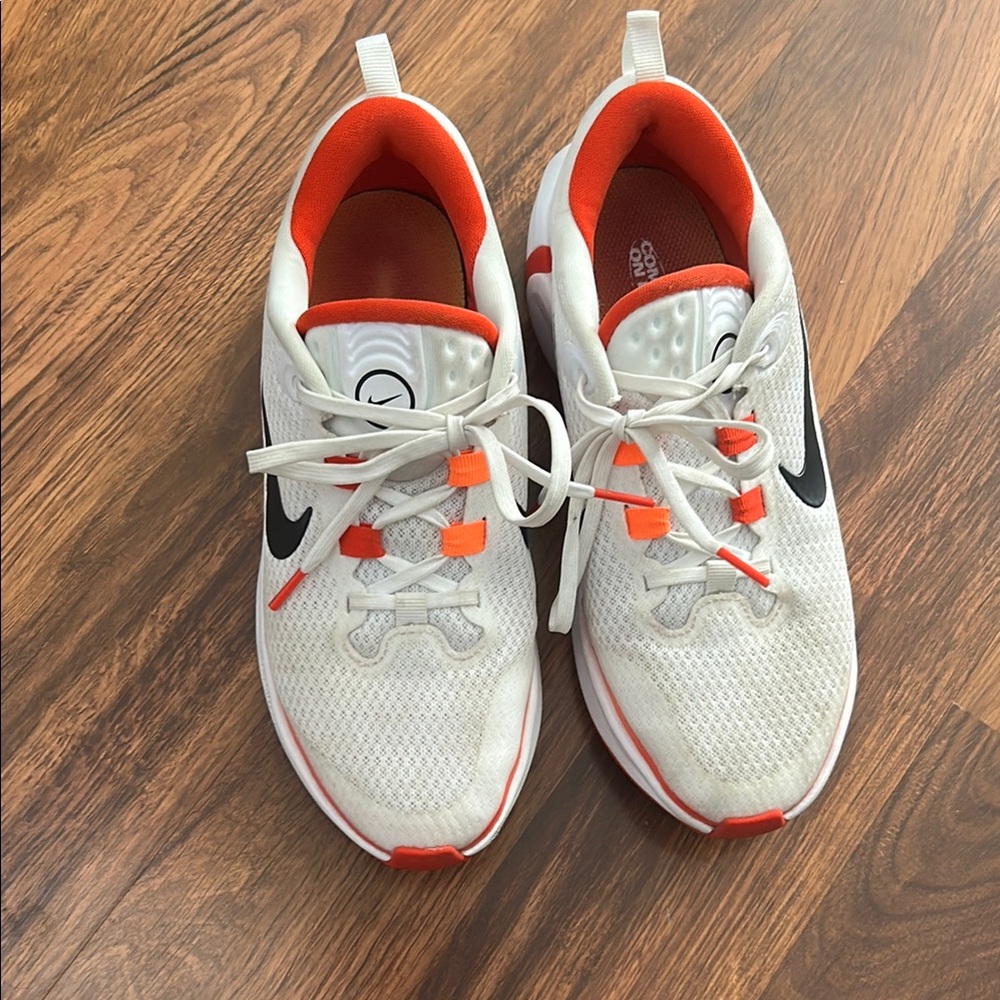 Nike White and Orange Sneakers with Sporty Design